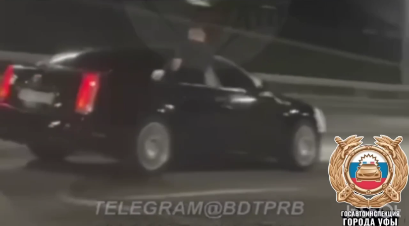 В Уфе водителя Cadillac наказали за поездку с вылезшим в окно пассажиром В Уфе водителя Cadillac наказали за поездку с вылезшим в окно пассажиром