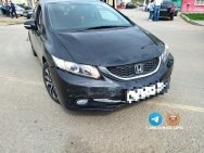 В Уфе иномарка опрокинулась на припаркованные автомобили